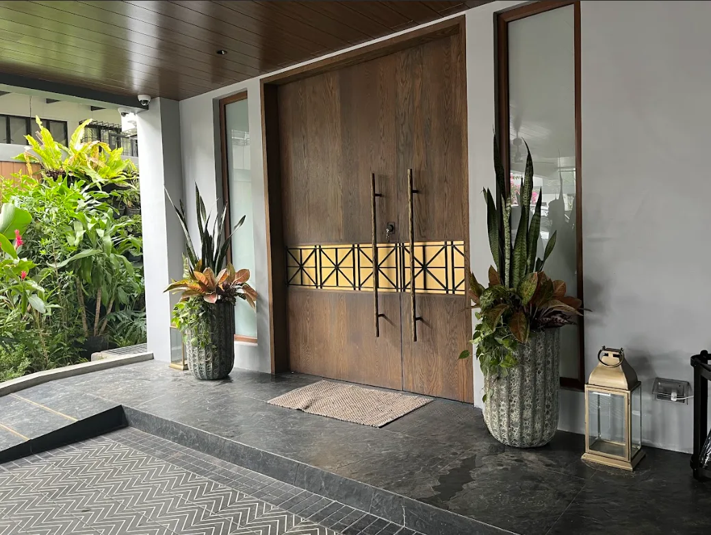 Indoor plants styled with paired pots in a Metro Manila home interior